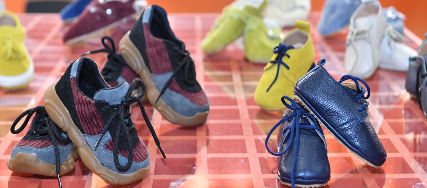 Baby shoes displayed at CBME Türkiye exhibition.